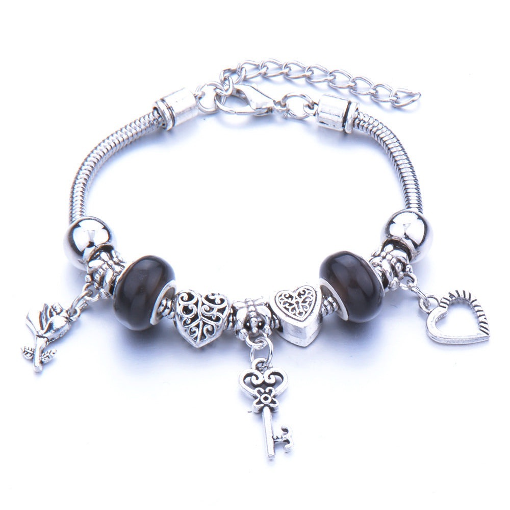 Silver Charm Bracelet with Heart and Key Accents